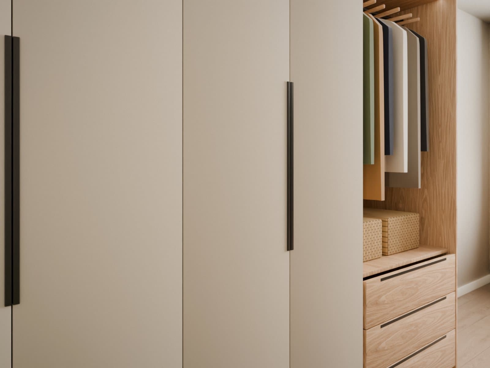 Vista lateral del closet: puertas batientes en melamina taupe con perfil negro vertical y zócalo retrasado